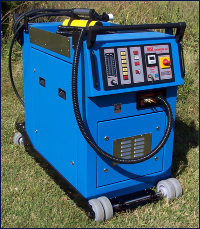 Mobile Induction Heater from the front view. The Mobile unit is powder coated with a hard epoxy paint. All access doors have lift handles and twist lock latches. All doors are fully removable. The Hand Held Heating Head features a flexible cable length of 30+ feet.