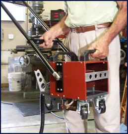 Roll-around unit is not much larger than a vacuum cleaner yet can lay down 30KW of induction power in 75 mm diameter circles or in heated linear strips.